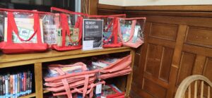 Image showing Memory Care Kits at Whiting Library. Kits are contained in a bag. Each kit has puzzles, games, or manipulatives.